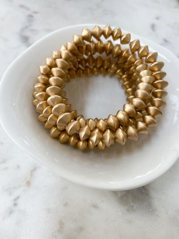 products/GoldSaucer8mmWoodBeads.jpg